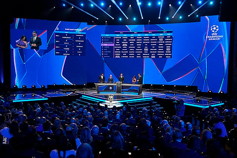 2024-25 UEFA Champions League Draw: Gianluigi Buffon, UEFA's Giorgio Marchetti and player Cristiano Ronaldo during the draw